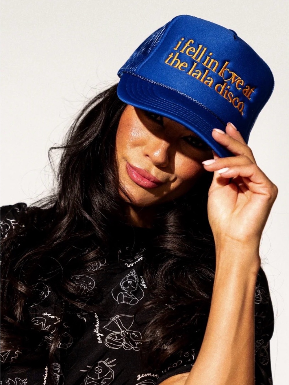 Dressed in LALA Disco Trucker Hat
